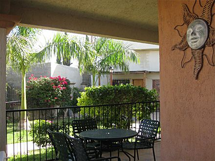 Wide porches on the interior garden side
provide ample room for outdoor furniture.