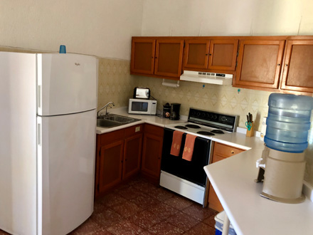 Our fully-furnished kitchen has ample counters
and is adjacent to the dining area
and fully-furnished laundry room